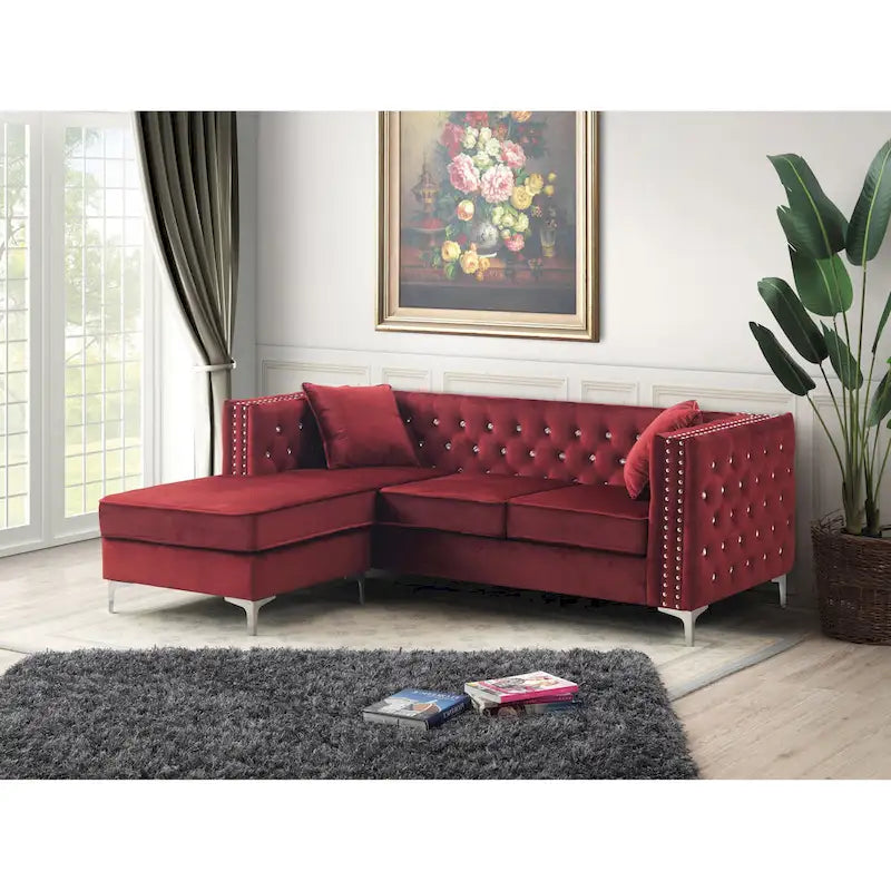 Samtsofa mit Knopfheftung und wendbarer Ottomane