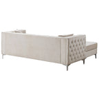 Aksamitna sofa pikowana z odwracalnym szezlongiem
